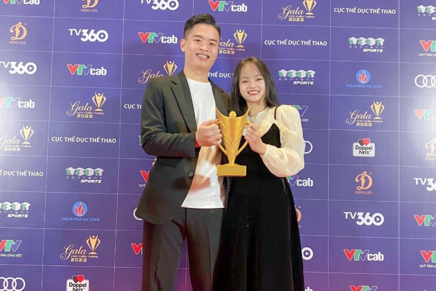 Xạ thủ Phạm Quang Huy và bạn gái. Ảnh: FBNV