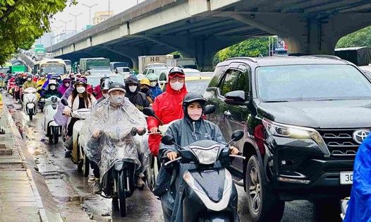 Dự báo Hà Nội có mưa rải rác vào sáng mai 29.1. Ảnh: Tô Thế
