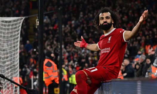 Salah ăn mừng ngạo nghễ sau chiến thắng quan trọng cuối tuần trước. Ảnh: AFP