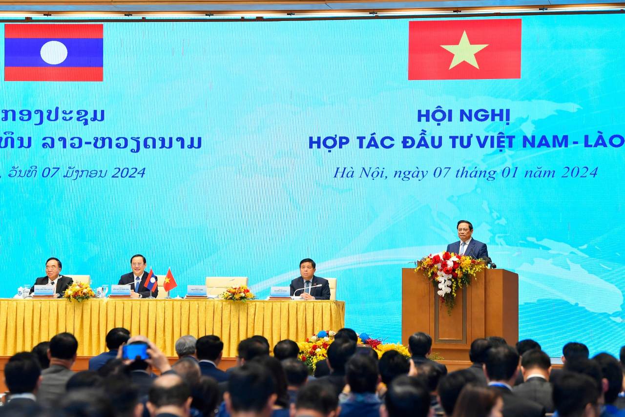 Thủ tướng Chính phủ Phạm Minh Chính và Thủ tướng Lào Sonexay Siphandone đồng chủ trì Hội nghị Hợp tác đầu tư Việt Nam - Lào. Ảnh: Hải Nguyễn