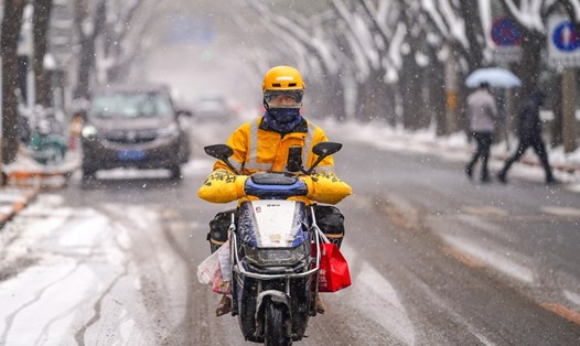 Tuyết rơi ở Bắc Kinh, Trung Quốc trong đợt rét đậm ngày 13.12.2023. Ảnh: Xinhua