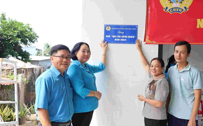 Union member Pham Thi Thoa is very happy to have a new house of her own. Photo: My Linh