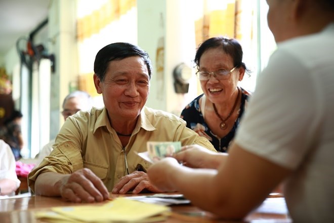Hanoi residents receive pensions. Photo: Hai Nguyen