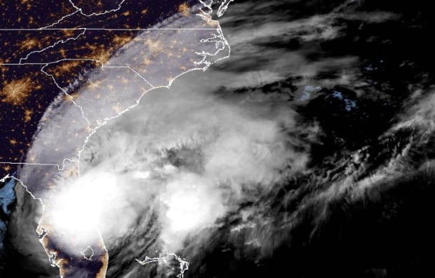 Hinh anh ve tinh cua con bao Milton sau khi do bo vao Florida. Anh: NOAA