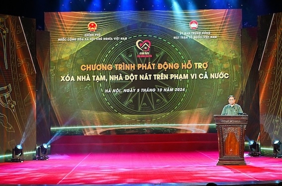 Prime Minister Pham Minh Chinh speaks at the program launching support for eliminating temporary and dilapidated houses. Photo: Organizing Committee.