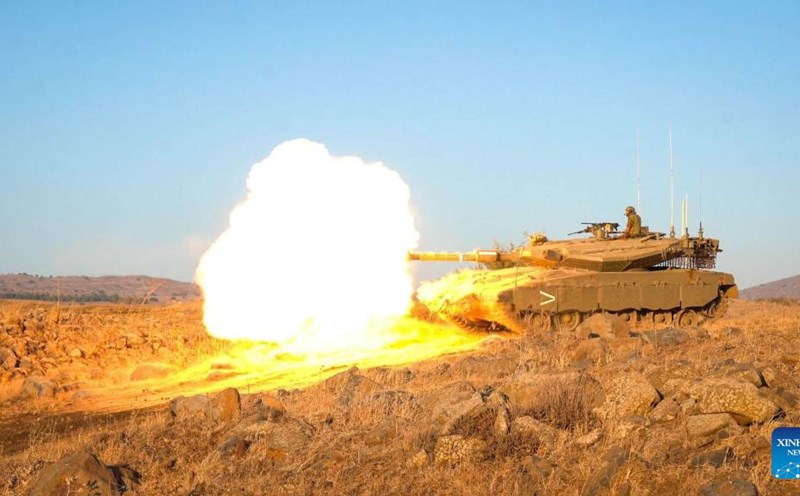 Israeli tanks fire in Lebanon. Photo: Xinhua