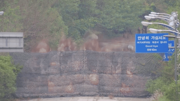 North Korea blows up inter-Korean border. Photo: AFP