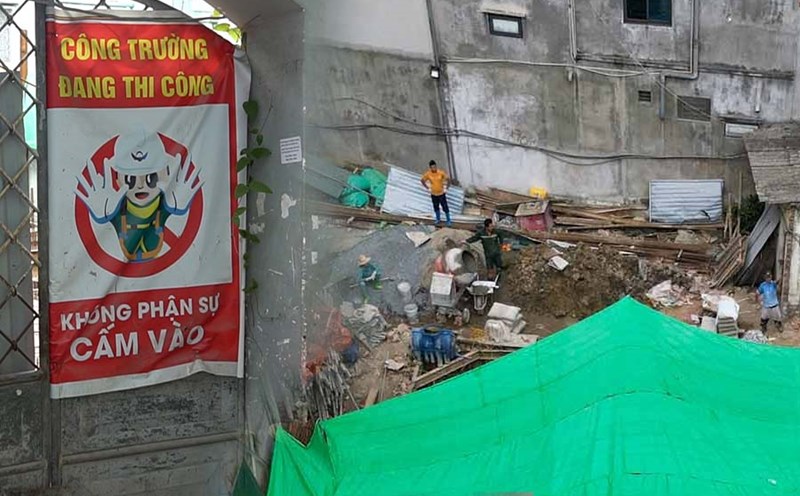 Công nhân ở công trình gây sụt lún để hút nước phòng dịch