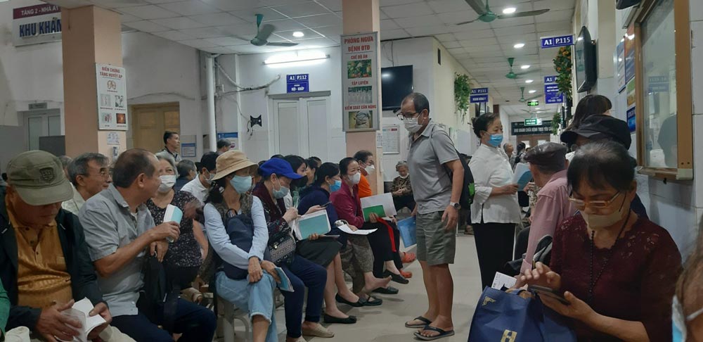 Patients waiting for health insurance examination. Photo: Minh Minh
