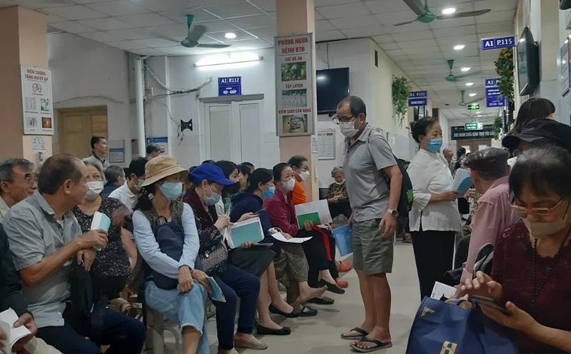 Patients waiting for health insurance examination. Photo: Minh Minh