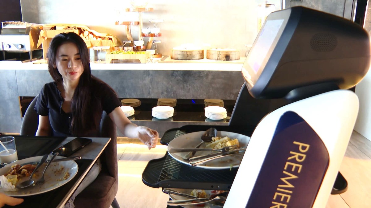 Robots serving guests at hotels