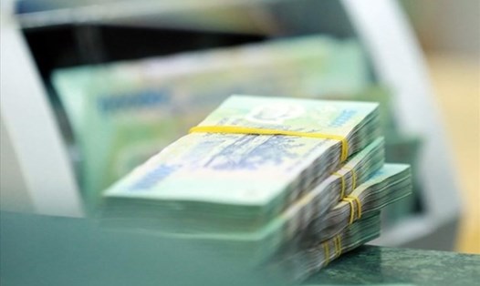 Tiền gửi ngân hàng lập kỷ lục. Ảnh: Trà My