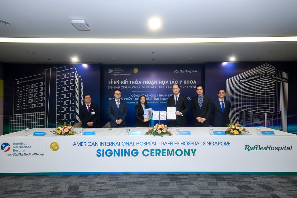 American International Hospital (AIH) signed a Medical Cooperation Agreement with Raffles Hospital Singapore. Photo: DN provided