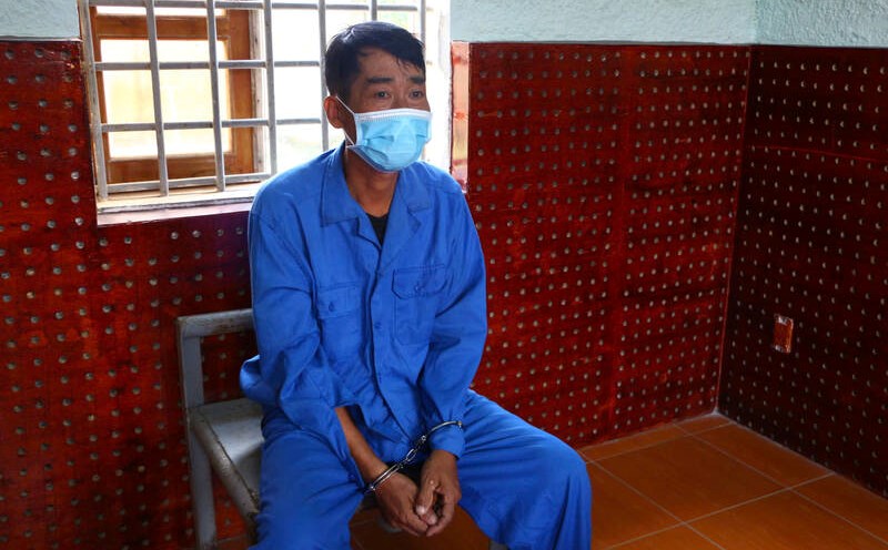 Man burned drinking buddy to death for throwing away snakehead fish head. Photo: Provided by police.