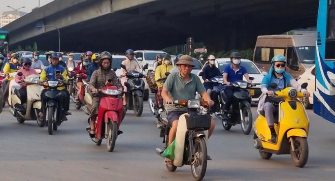 Motorbikes and motorcycles are the main source of emissions in traffic. Photo: Hoang Loc