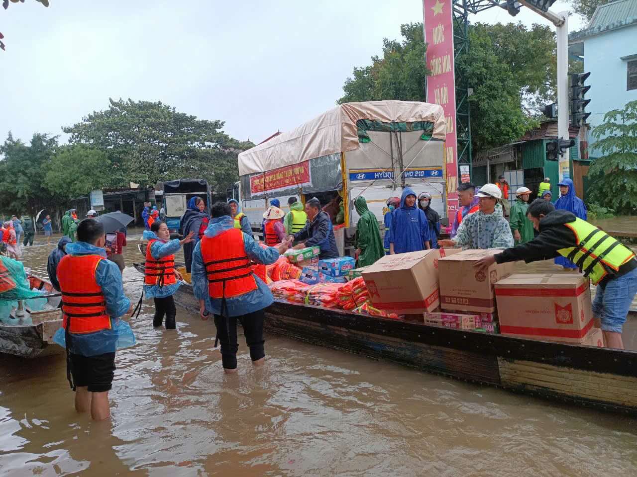 Relief goods are transported to people in flood-hit areas. Photo: T. Nguyen