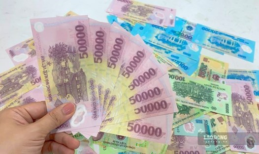 Lãi suất Vietcombank mới, gửi 500 triệu đồng nhận lãi 70,5 triệu đồng. Ảnh: LDO