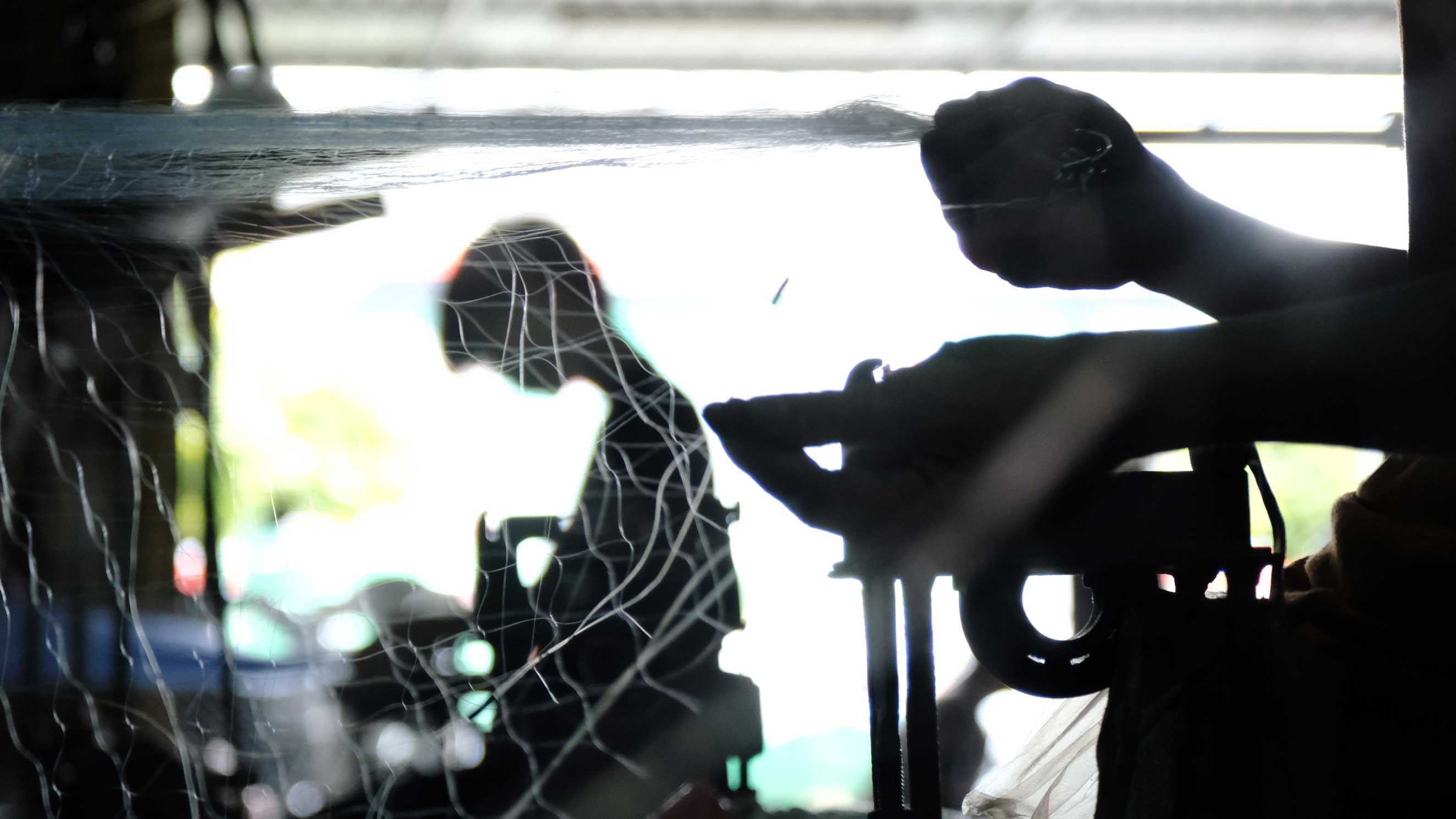 During the flood season, workers in Thom Rom net weaving village have extra income thanks to the high volume of work.