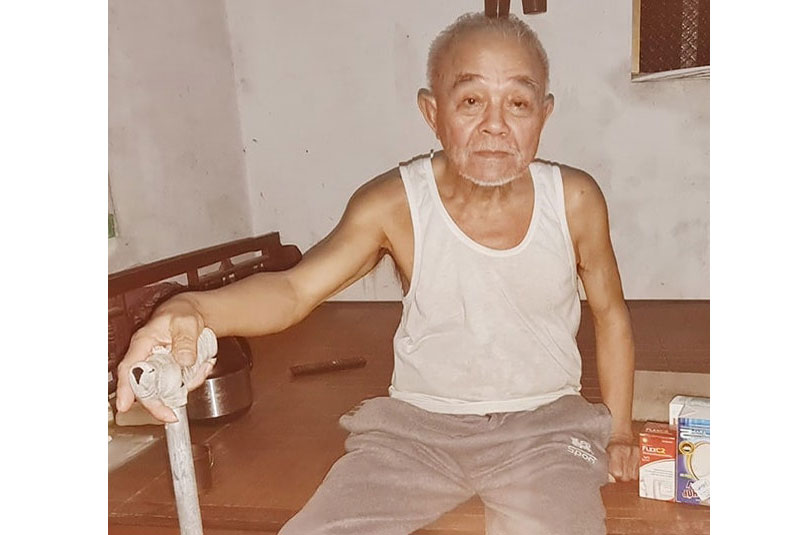 Ông Làn chưa nhận được trợ cấp người có công theo mức mới. Ảnh: Mạnh Cường