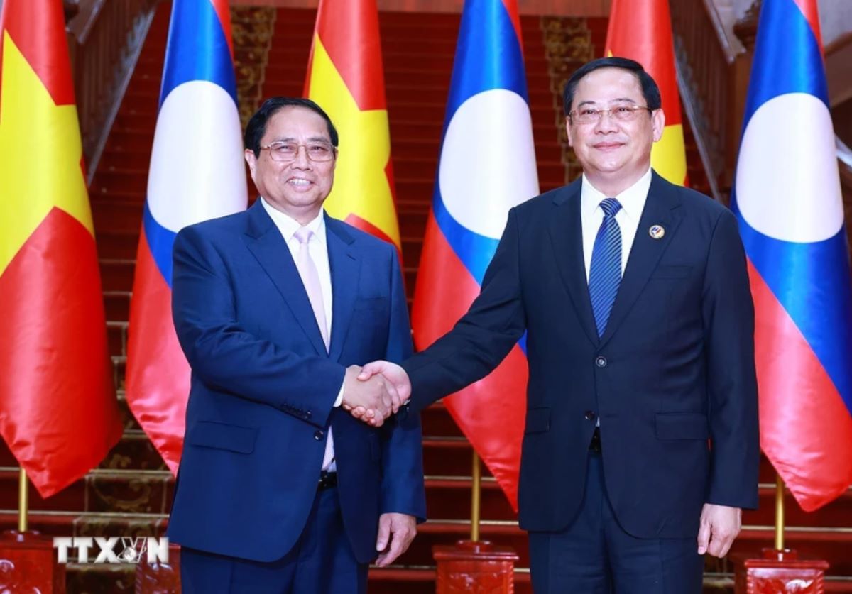 Thủ tướng Chính phủ Phạm Minh Chính và Thủ tướng Lào Sonexay Siphandone. Ảnh: TTXVN