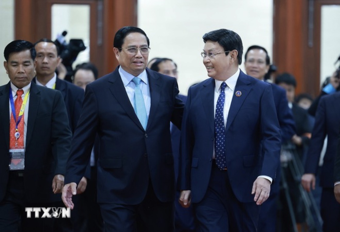 Thủ tướng Chính phủ Phạm Minh Chính và Chủ tịch Quốc hội Lào. Ảnh: TTXVN