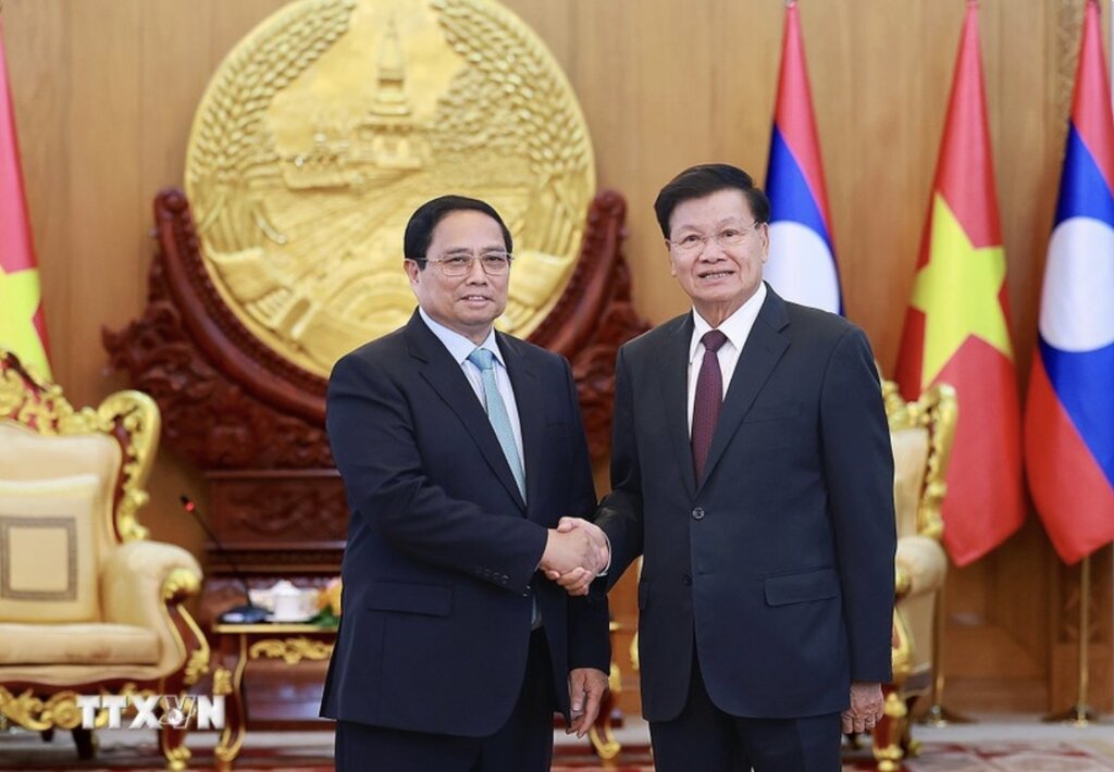 Thủ tướng Chính phủ Phạm Minh Chính hội kiến Tổng Bí thư, Chủ tịch nước Lào Thongloun Sisoulith. Ảnh: TTXVN