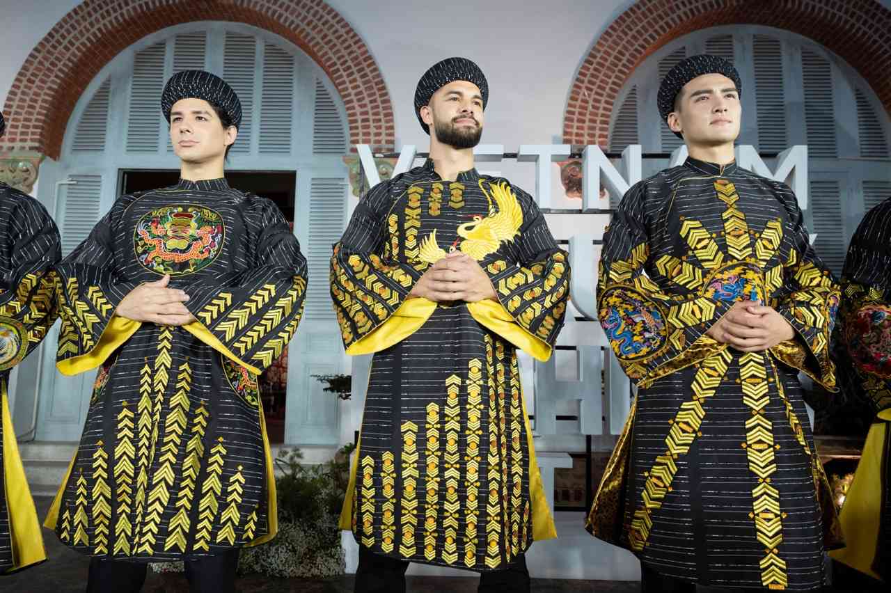 Mr World contestants perform in Ao Dai. Photo: Golden Lotus.