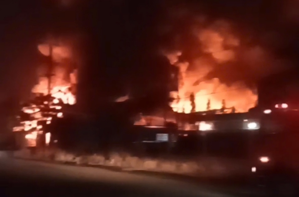 Scene of a large fire at a pesticide company in Long An. Photo: Provided by local residents
