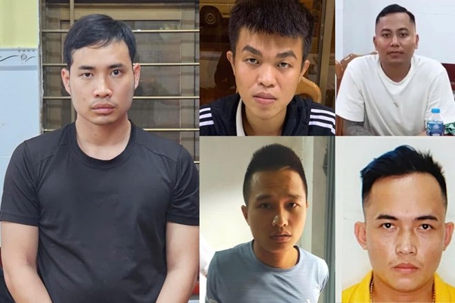 Nguyen Khac Manh (white shirt, top row, right) and his accomplices lured the victims to Cambodia for light work with high salaries, then kidnapped and tortured them for ransom. Photo: Provided by the police
