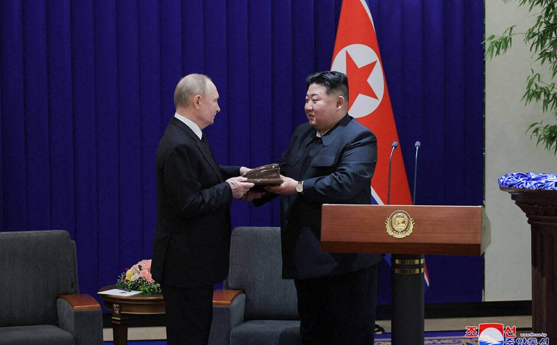 North Korean leader Kim Jong Un presents the Order of Kim Il Sung to Russian President Vladimir Putin in Pyongyang in June this year. Photo: AFP