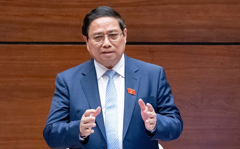 Prime Minister Pham Minh Chinh answers questions on the afternoon of November 12. Photo: National Assembly
