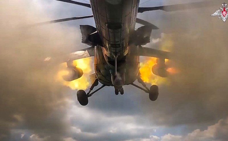 A Russian Mi-35M helicopter fires a missile at Ukrainian Armed Forces in Kursk Oblast, Russia, August 2024. Photo illustration AFP