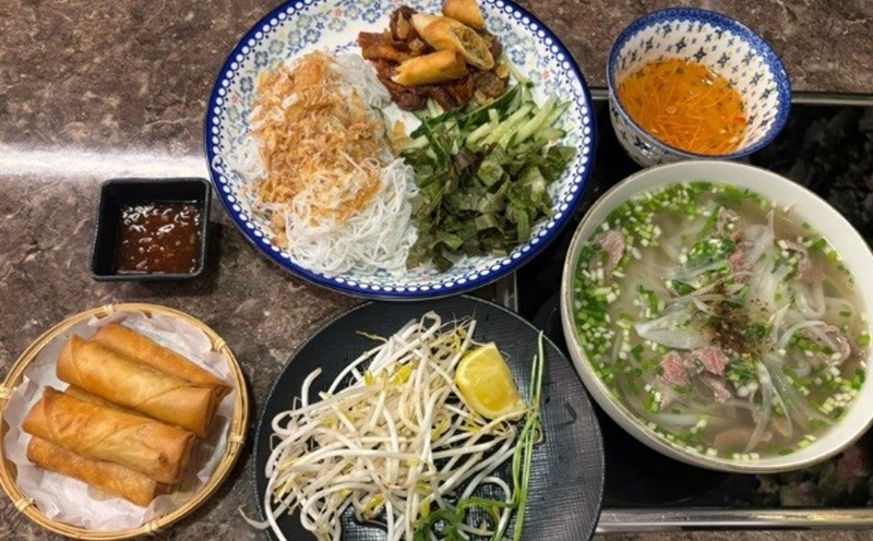 Beef noodle soup, spring rolls and vermicelli with grilled pork at Beo Bun Cha restaurant. Photo: Arum