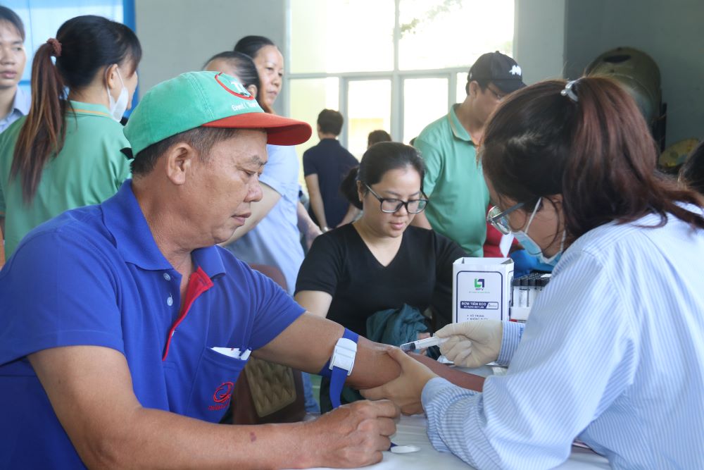 Industrial park workers in Khanh Hoa province enjoy union benefits with a free cancer screening program. Photo: Phuong Linh