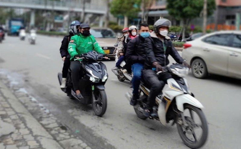 Technology motorbike taxi drivers working. Illustration photo: Xuyen Dong
