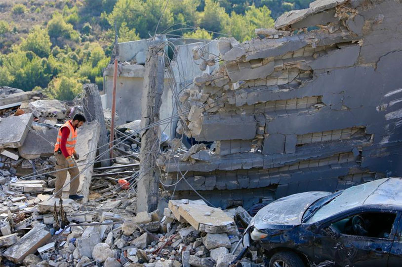 Rescue workers clear debris in Lebanon after an Israeli attack. Photo: Xinhua