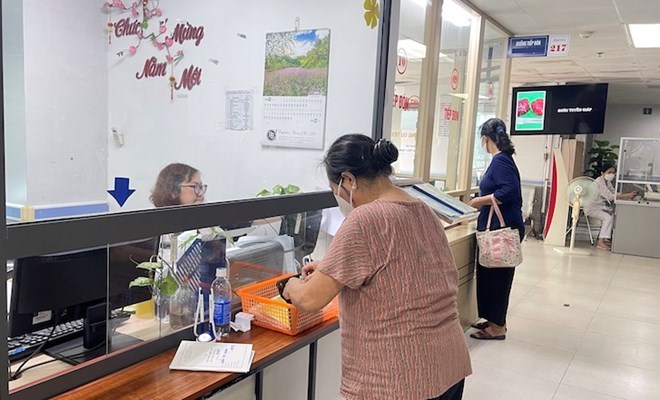 Local social insurance agencies regularly urge businesses to resolve long-standing social insurance debt. Photo: Ha Anh