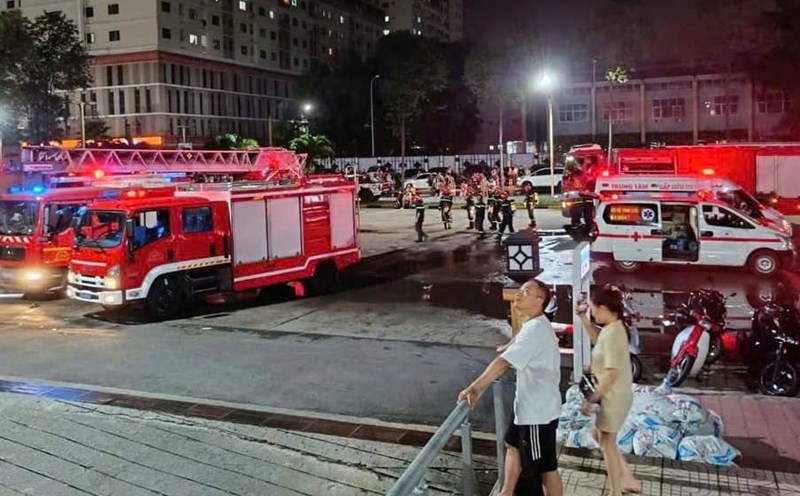 Apartment fire in HCMC apartment building at night.