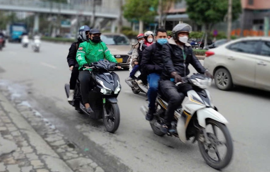 Bac Kan proposes that motorbike taxi drivers must have their own uniforms. Illustration: Xuyen Dong