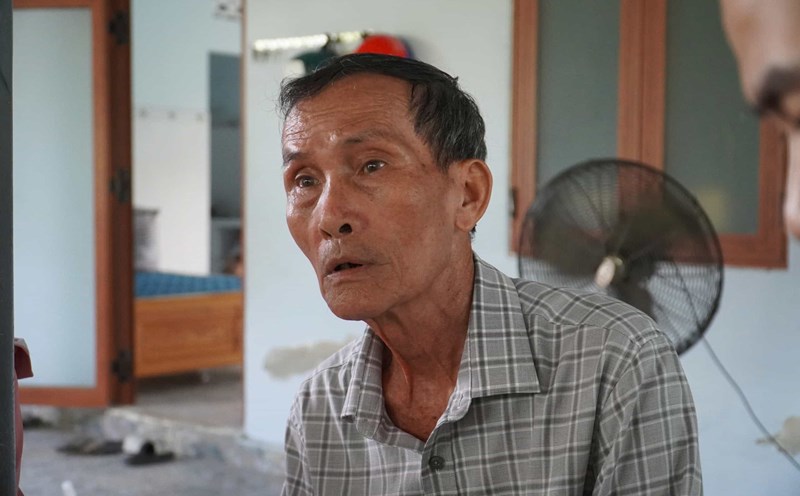 Mr. Tran Thanh Doan is one of several residents in Van Ninh district who complained about the change in direction of the coastal road. Photo: Huu Long