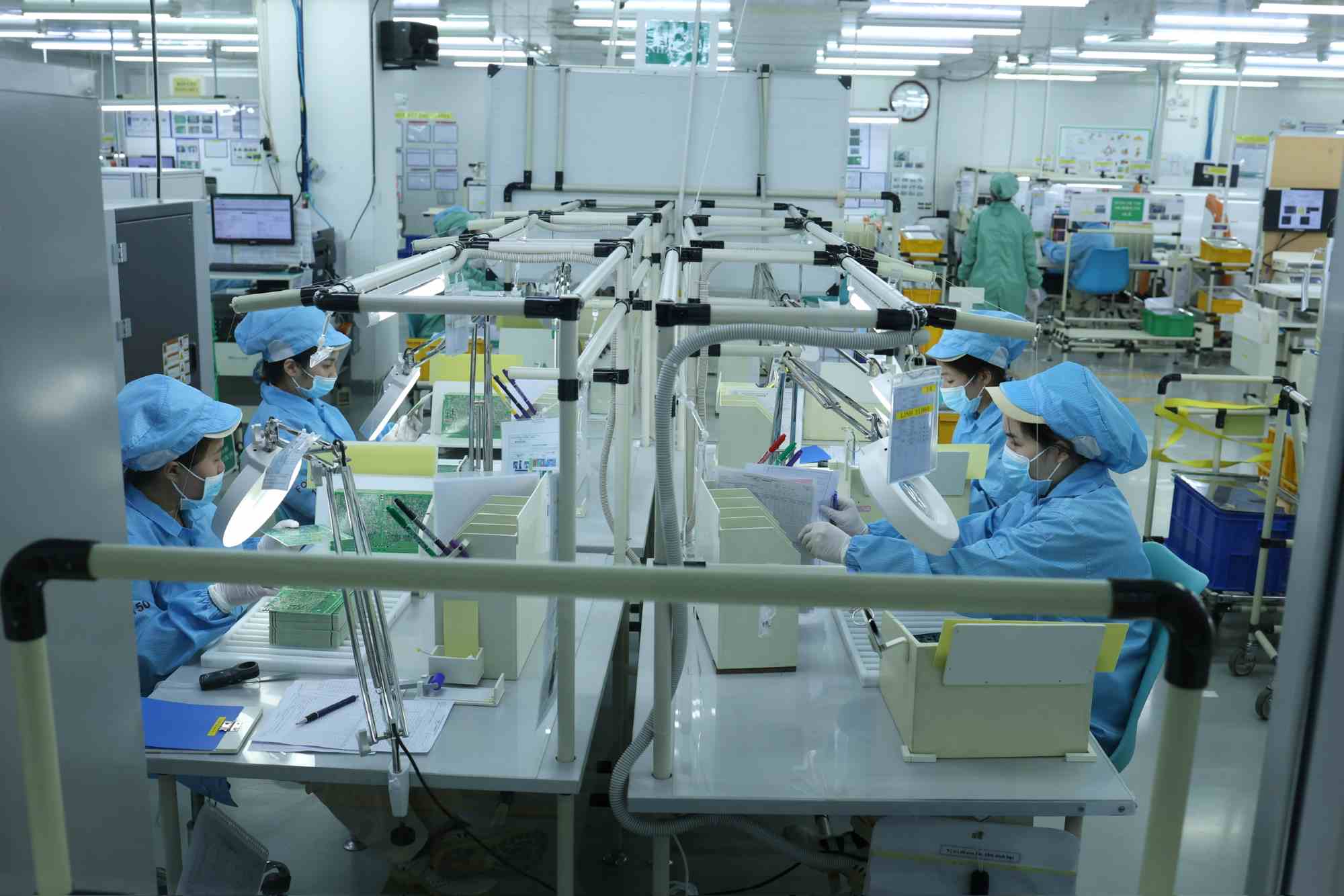 Workers of Meiko Vietnam Company, which specializes in manufacturing electronic printed circuit boards, at Thach That Industrial Park, Hanoi. Photo: Hai Nguyen