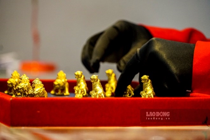 Most experts are optimistic about gold prices next week. Illustration: Phan Anh