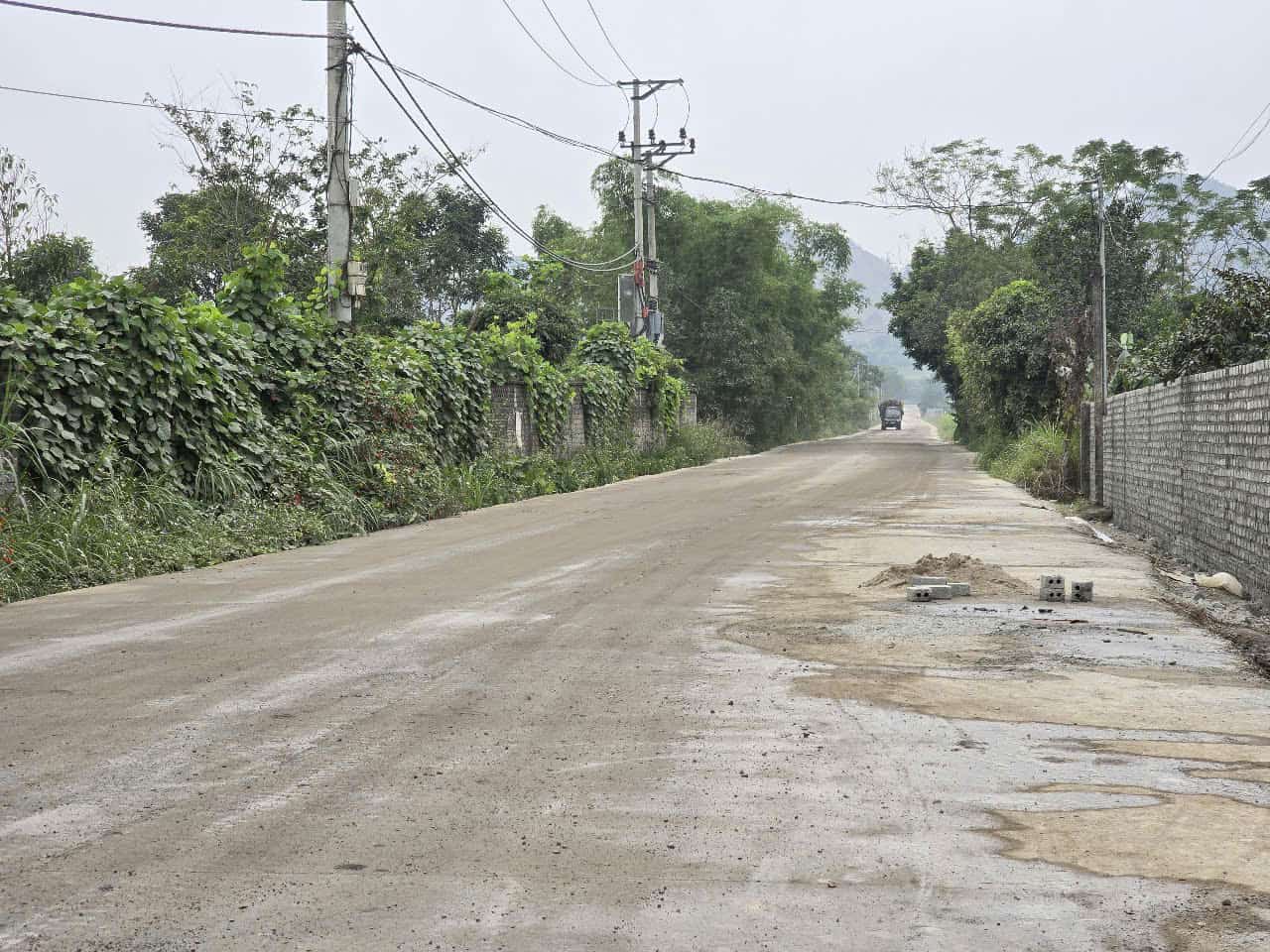 After people blocked the road in protest, the mining companies rebuilt the concrete road for the people. Photo: Nguyen Truong