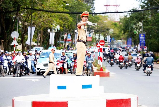 Traffic police will be equipped with smart devices during traffic control. Photo: Ministry of Public Security