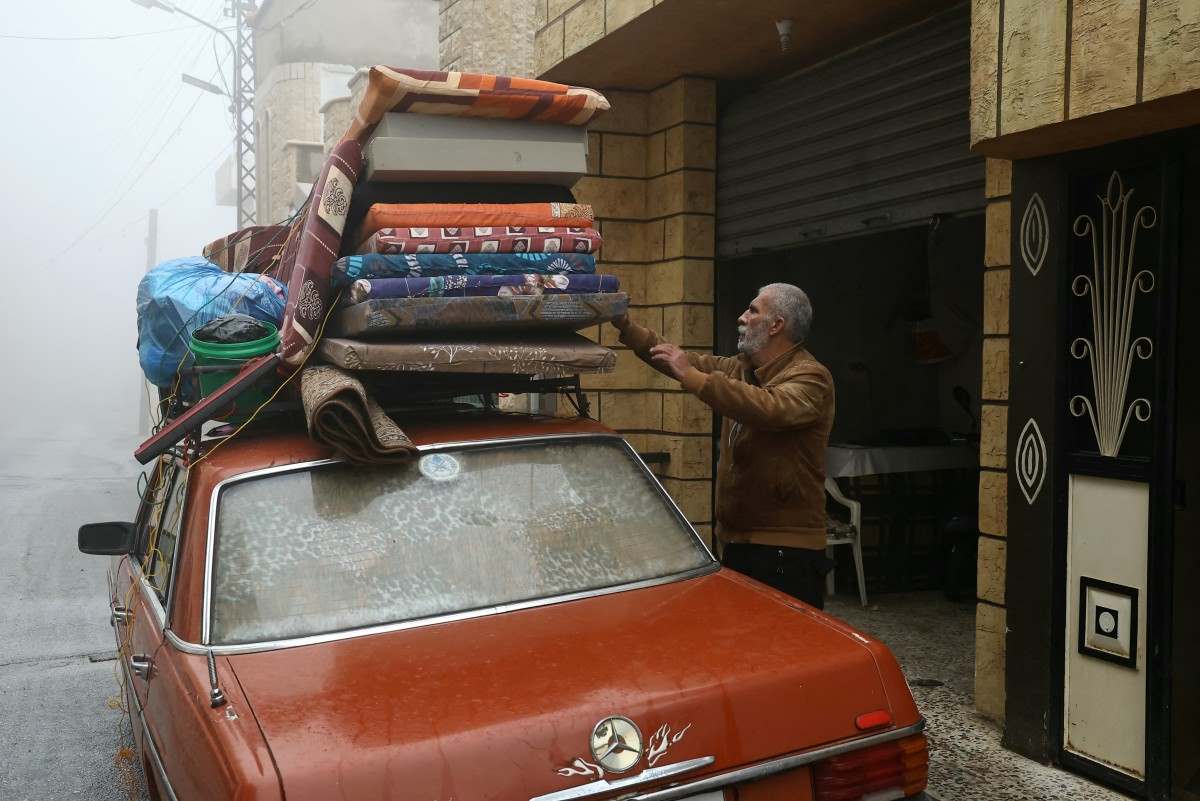 A resident who fled the village of Shebaa on Lebanon's southern border returns home following a ceasefire between Israel and Hezbollah. Photo: AFP