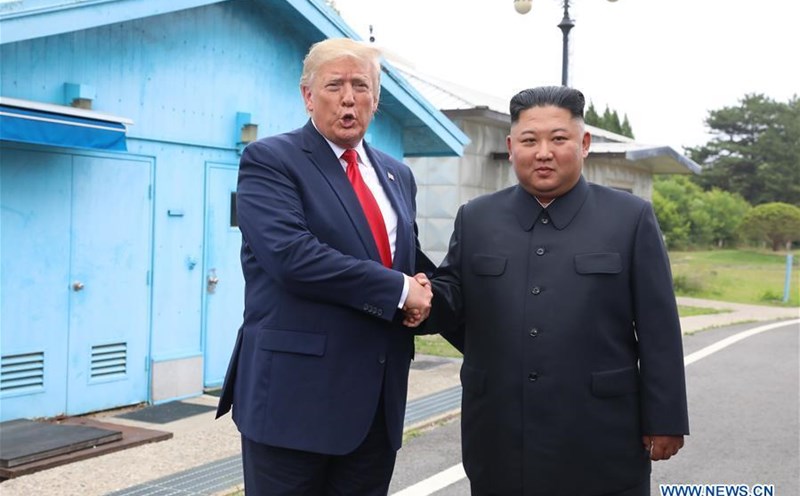President Donald Trump and North Korean leader Kim Jong-un at the border village of Panmunjom on June 30, 2019. Photo: Xinhua