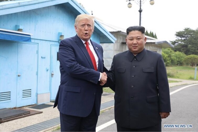 President Donald Trump and North Korean leader Kim Jong-un at the border village of Panmunjom on June 30, 2019. Photo: Xinhua