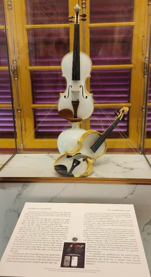 Porcelain violin gifted by artist Xuan Huy to Hue
