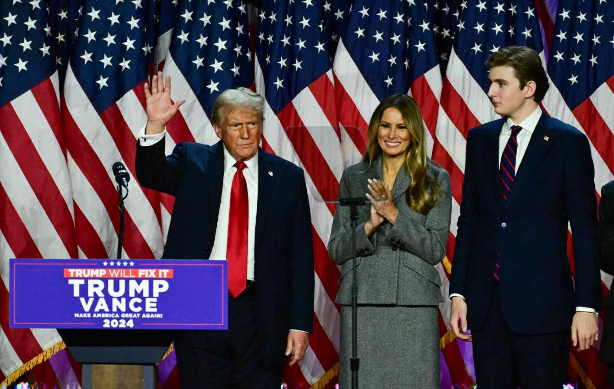 Mr. Donald Trump with Mrs. Melania Trump and their son at the post-election event on November 6. Photo: AFP