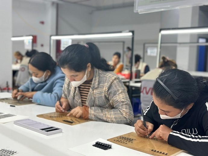 Many businesses in Dak Lak have planned to give Tet bonuses to their employees. Photo: BAO TRUNG